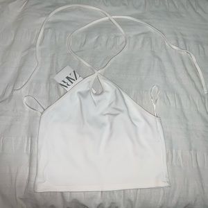 White medium halter top, brand Zara. Condition is brand new, never worn.
